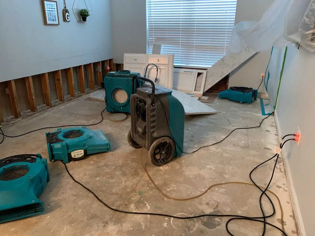 Dehumidifier in flood-cut room for Water Damage Restoration in Mascotte